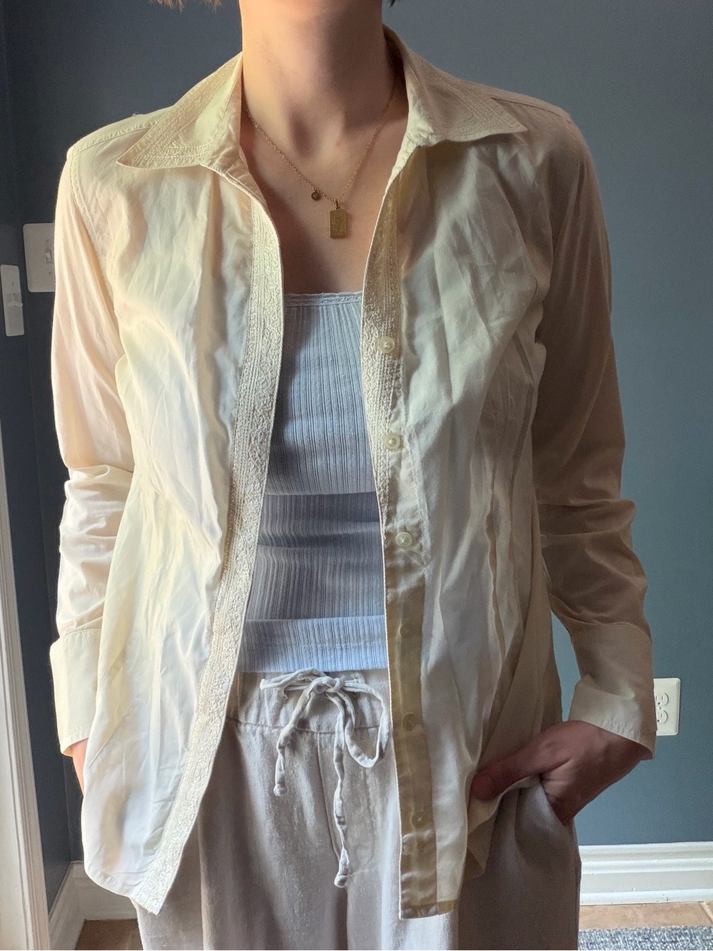 Classic Cream Button-Down Shirt with Subtle Trim